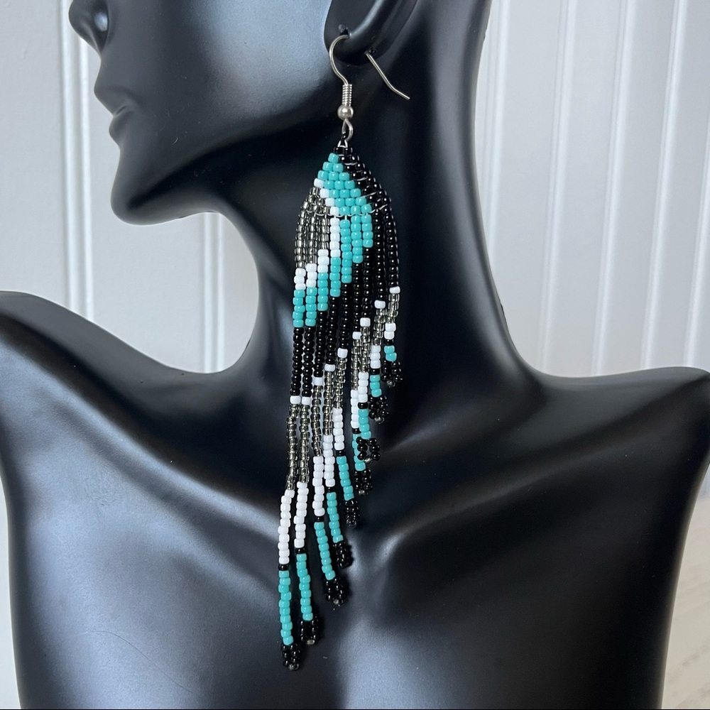 Super cute seed bead fringe “wing” earrings!
